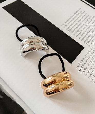 Cola, liga con puño de metal Ponytail